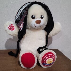 Winter beanie hat with tassel‎ and ear flaps